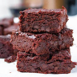 closeup of red wine brownies stacked on counter closeup of red wine brownies stacked on counter