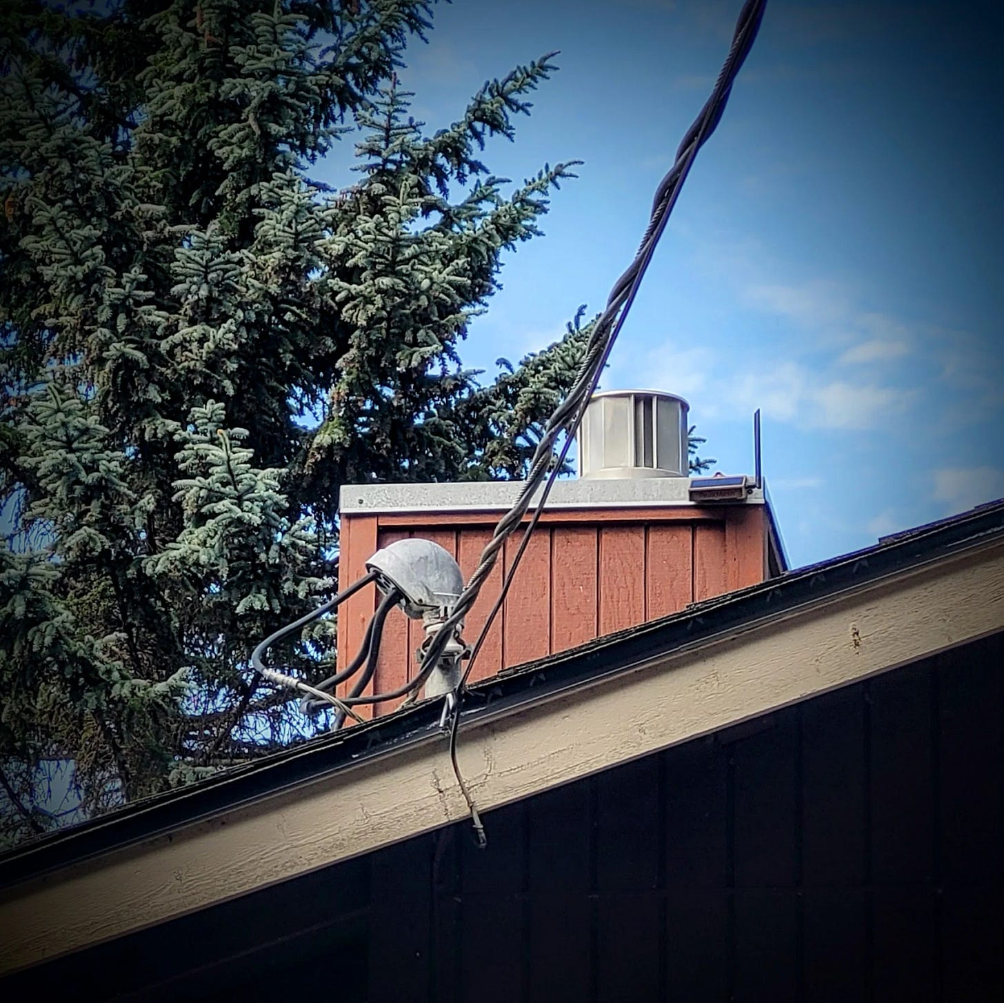 MeshCore repeater attached to chimney cap MeshCore repeater attached to chimney cap