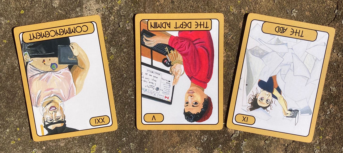 three tarot cards on a stone: Card 21, Commencement reversed shows a young woman smiling behind a face mask. Card 5, the department admin, shows a person on a computer dangling a keychain. card 9, the ABD, shows a woman with wild hair typing amid cascading papers.