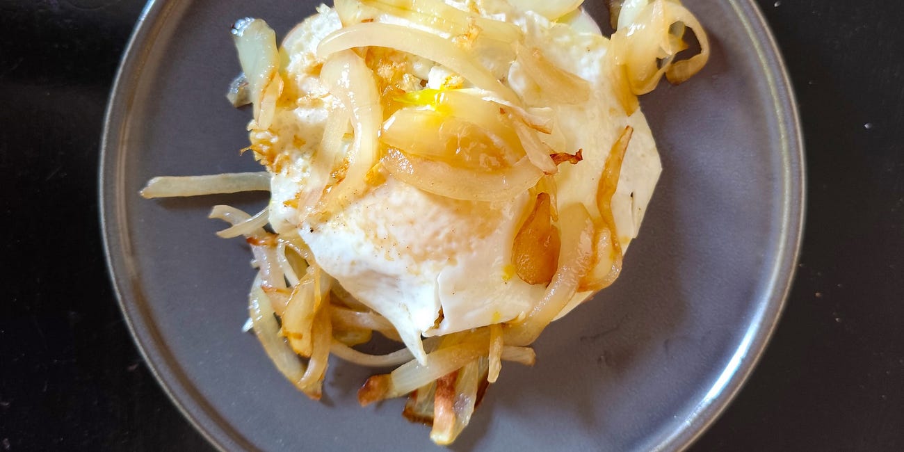Astrid's pre-surf egg, onion & cheese breakfast potatoes