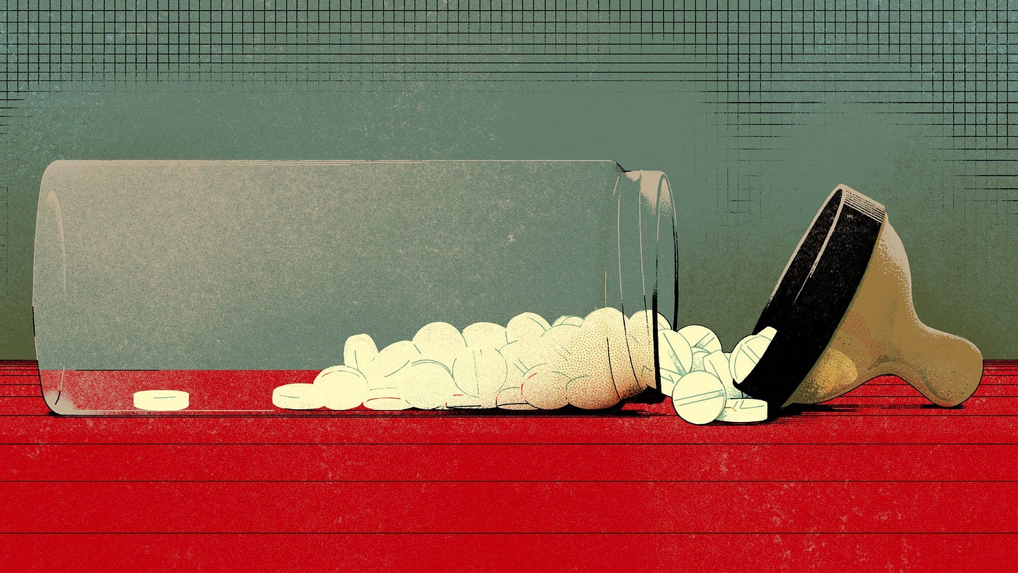 Biberon pieno di pillole