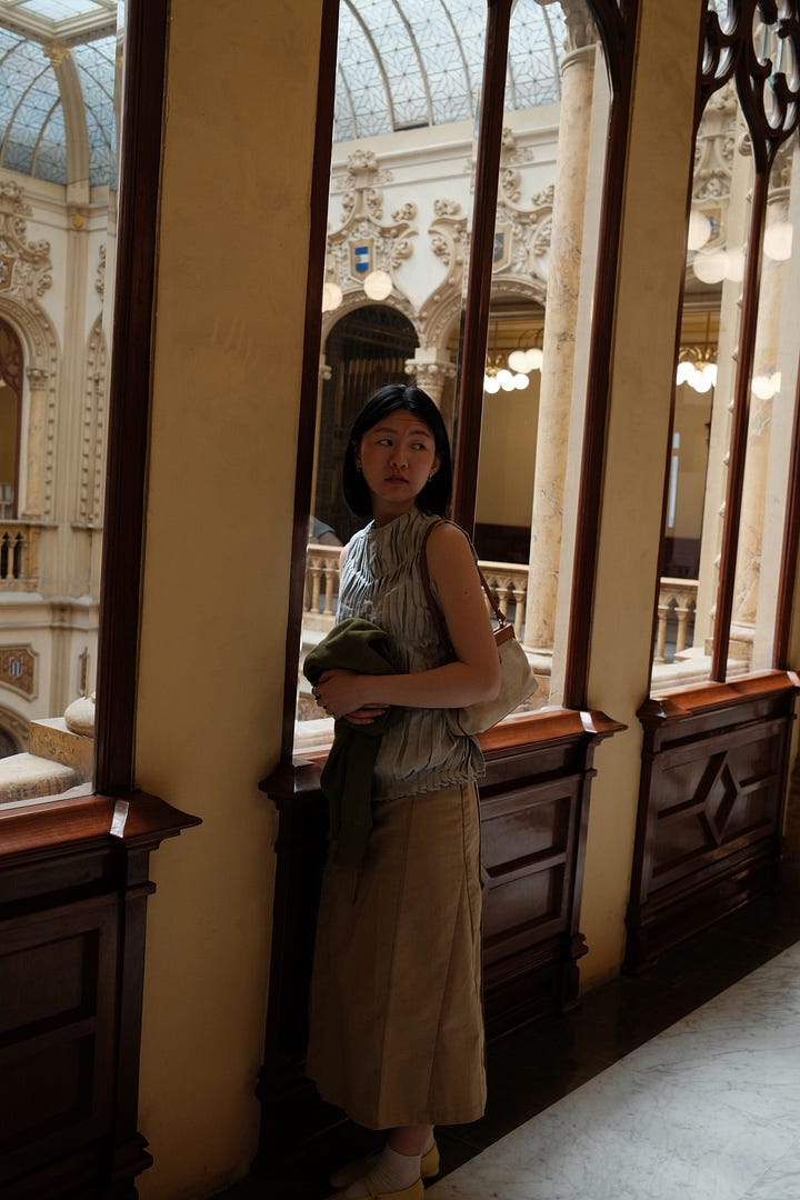 First image is me standing in front of some closet doors, second image is me at the postal office museum