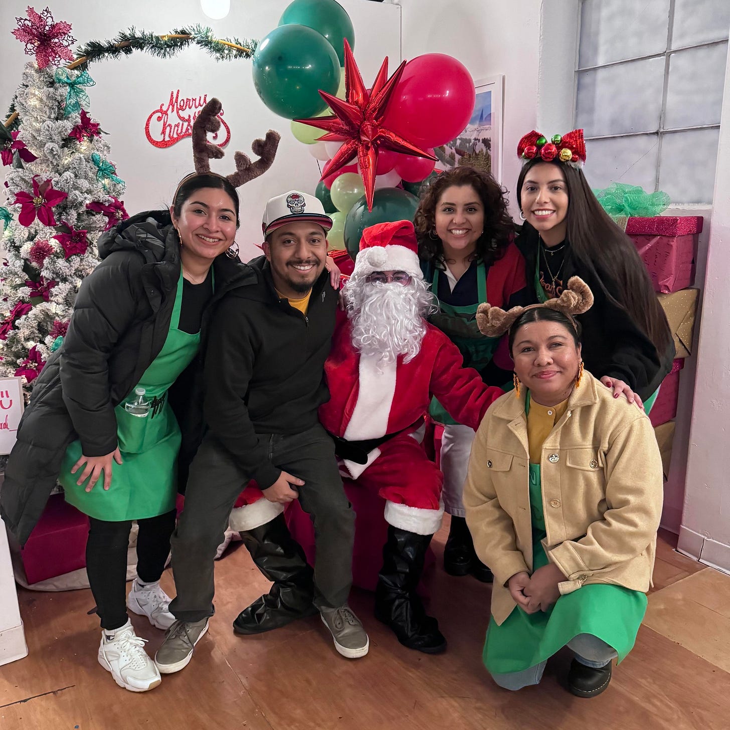 May be an image of 6 people, christmas tree and text