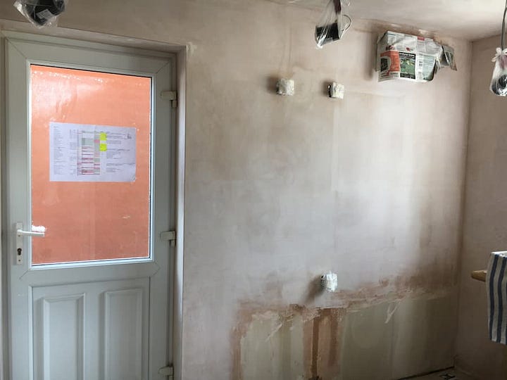 New ceiling and freshly plastered walls