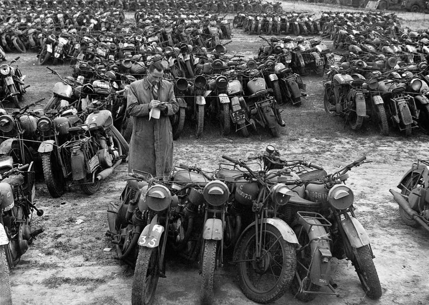 Hundreds of surplus military motorcycles in England are grouped together, destined for the scrapyard. Hundreds of surplus military motorcycles in England are grouped together, destined for the scrapyard.
