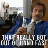 a man in a suit and tie is holding a bottle of beer and says " that really got out of hand fast "