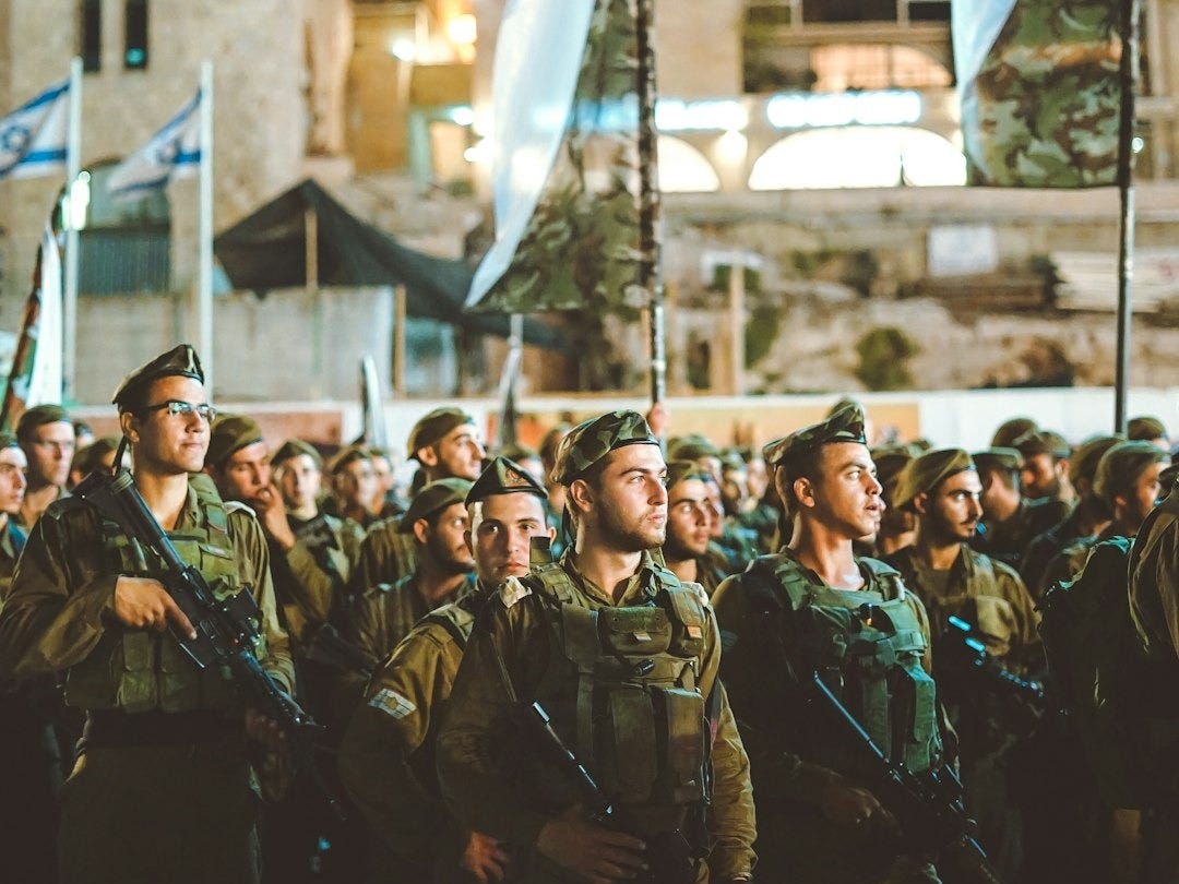 group of armed men with white flag group of armed men with white flag