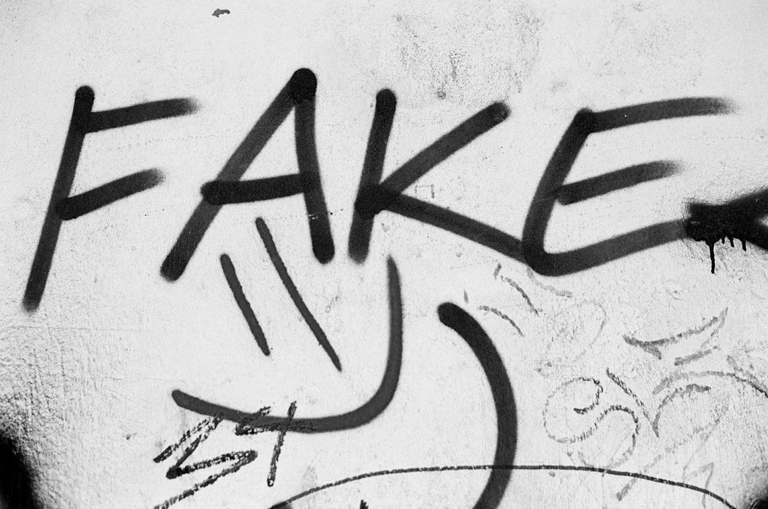 graffiti on a wall that says fake graffiti on a wall that says fake