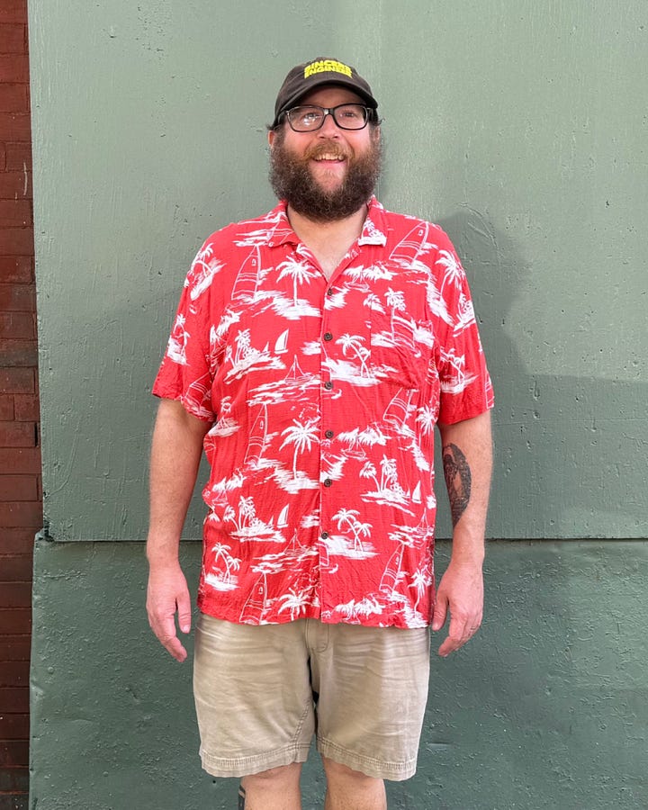 The author wearing a black Spurs jersey on the left, an orange-ish Hawaiian shirt on the right