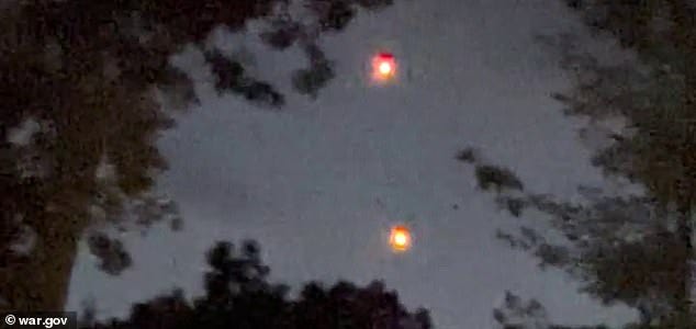 GRBAS In July 2025, at approximately 2100 local time in the northeastern United States, an eyewitness observed an intense bright light in their backyard as they parked their car upon returning home from work. The light was hovering approximately 25 feet off the ground, below a tree line near the center of their backyard, at an estimated distance of 90 feet. The eyewitness exited their vehicle briefly before retrieving their phone to record the event. The spouse of the eyewitness came outside to assess the situation. The spouse also witnessed the light, describing it as a "brilliant red sphere" about one meter in diameter. The center of the red sphere appeared to be a white plasma "sun" about the size of a basketball. The orb slowly rose and moved to the left, and both eyewitnesses observed a second, identical orb, hovering above the other orb.The eyewitness then began recording the event using an iPhone 14 Pro Max, capturing the footage depicted in this video. As the eyewitness began GRBAS In July 2025, at approximately 2100 local time in the northeastern United States, an eyewitness observed an intense bright light in their backyard as they parked their car upon returning home from work. The light was hovering approximately 25 feet off the ground, below a tree line near the center of their backyard, at an estimated distance of 90 feet. The eyewitness exited their vehicle briefly before retrieving their phone to record the event. The spouse of the eyewitness came outside to assess the situation. The spouse also witnessed the light, describing it as a "brilliant red sphere" about one meter in diameter. The center of the red sphere appeared to be a white plasma "sun" about the size of a basketball. The orb slowly rose and moved to the left, and both eyewitnesses observed a second, identical orb, hovering above the other orb.The eyewitness then began recording the event using an iPhone 14 Pro Max, capturing the footage depicted in this video. As the eyewitness began