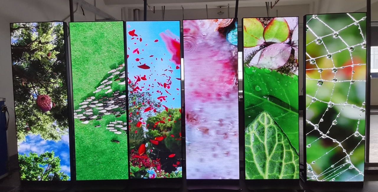 The LED poster: a surprisingly powerful screen you can just roll into a room