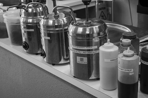 pictures of the inside of Yogurt Journey and all the colorful toppings