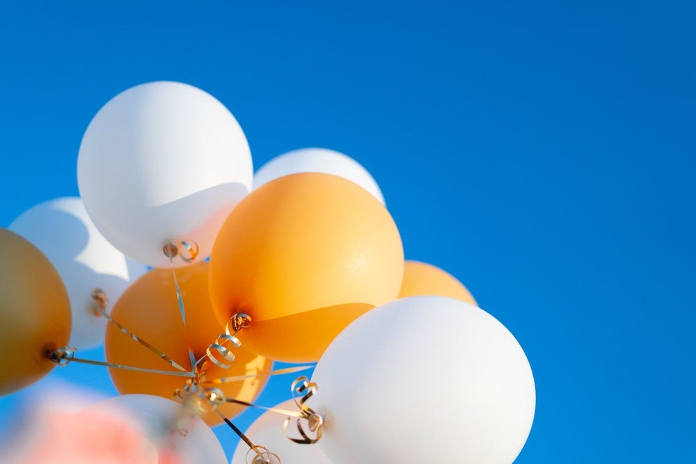 white blue and yellow balloons white blue and yellow balloons