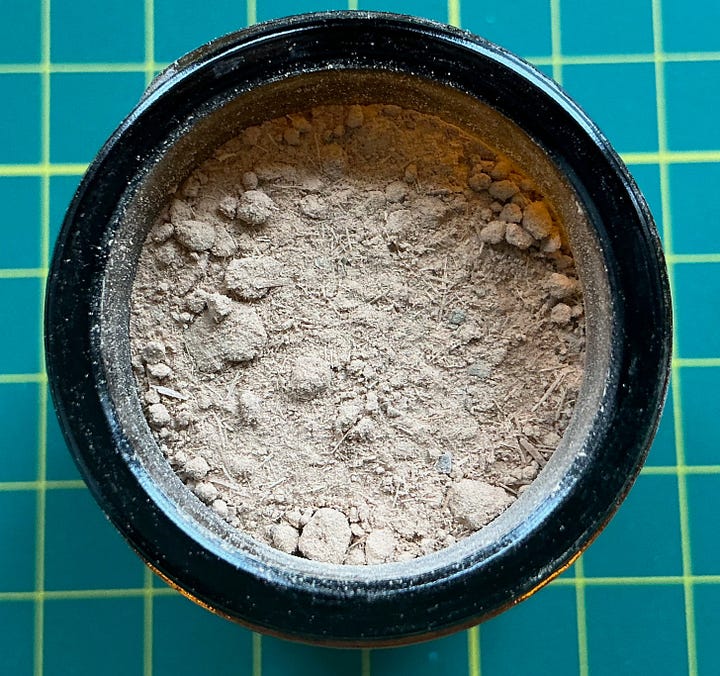 Four jars showing powdered barks