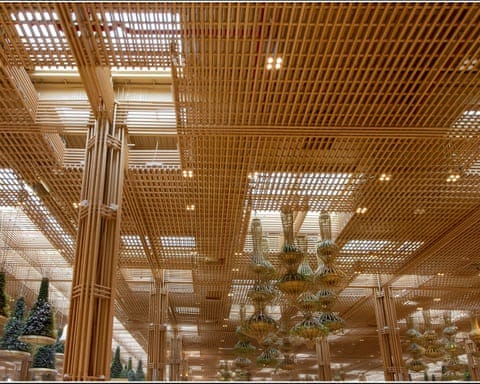 Interior of Kempegowda international airport's Terminal 2 with bamboo lattice ceiling