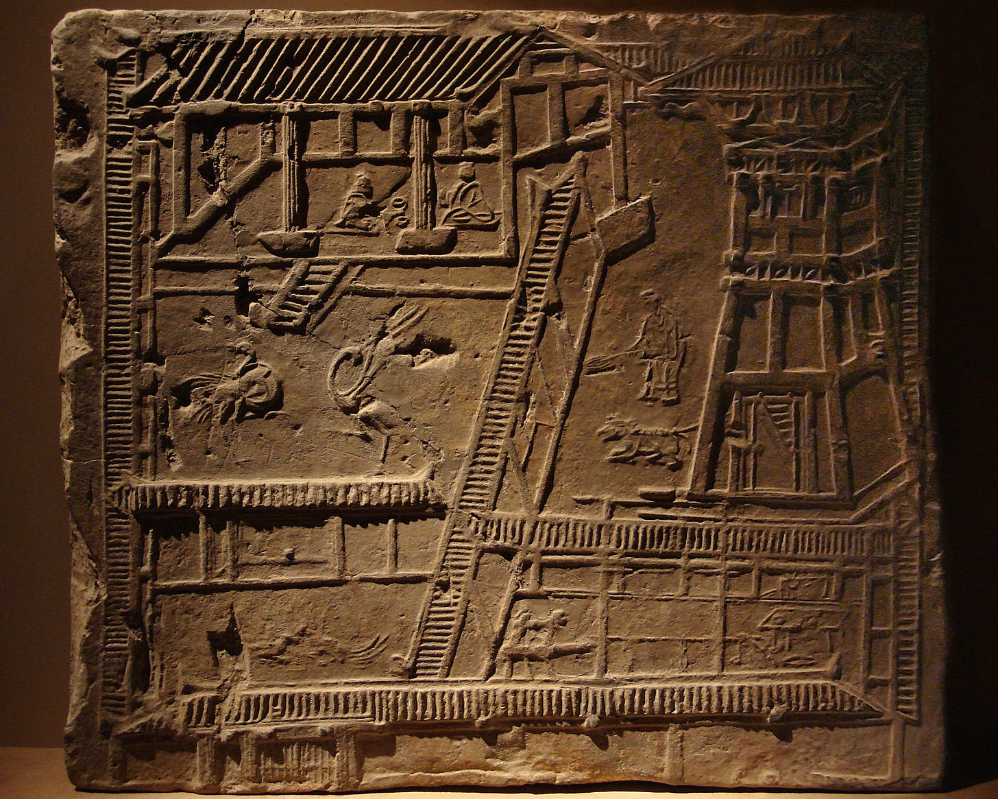 A colour photo of a tomb mural excavated in Excavated at Chengdu, Sichuan Province, 1954, depicted the courtyard of an Han official, with outdoor dining area and farmyard, and kitchen all within A colour photo of a tomb mural excavated in Excavated at Chengdu, Sichuan Province, 1954, depicted the courtyard of an Han official, with outdoor dining area and farmyard, and kitchen all within