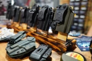A collection of gun holsters on display at Shot Show 2023 A collection of gun holsters on display at Shot Show 2023