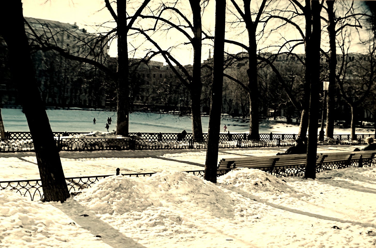 Moscow, patriarch's pond in wintertime, snow and skaters