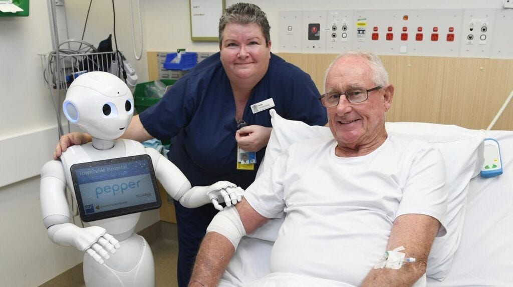 Image of Pepper, a healthcare robot, assisting an elderly patient. Image of Pepper, a healthcare robot, assisting an elderly patient.