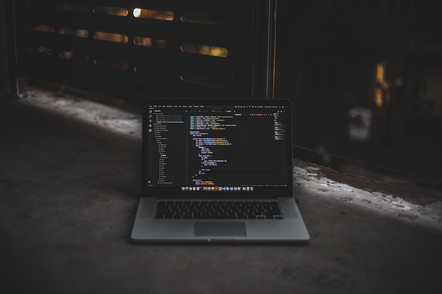Photo of laptop with nerdy code displayed. Photo of laptop with nerdy code displayed.