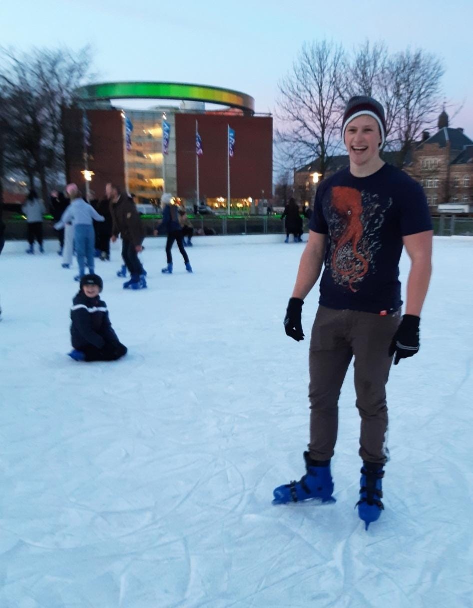A person wearing ice skates and smiling at camera

AI-generated content may be incorrect.