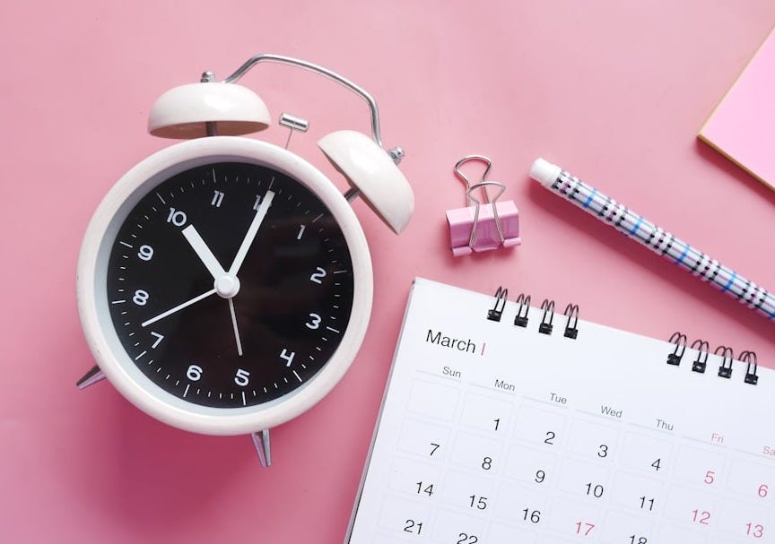 white and pink analog alarm clock white and pink analog alarm clock