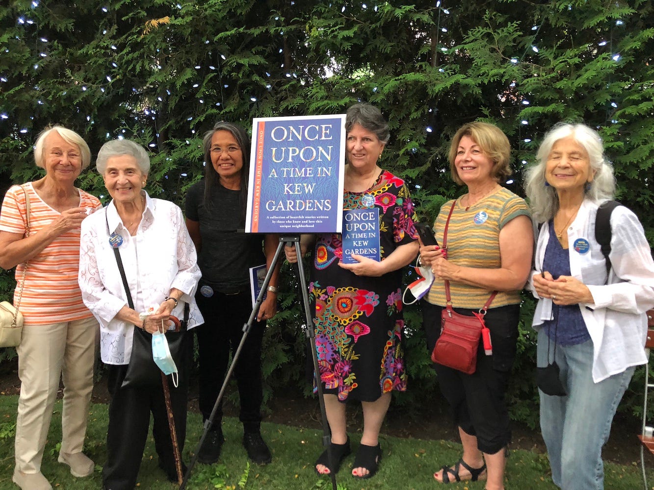 Angeline standing with other story contributors at the book's publishing party. Angeline standing with other story contributors at the book's publishing party.