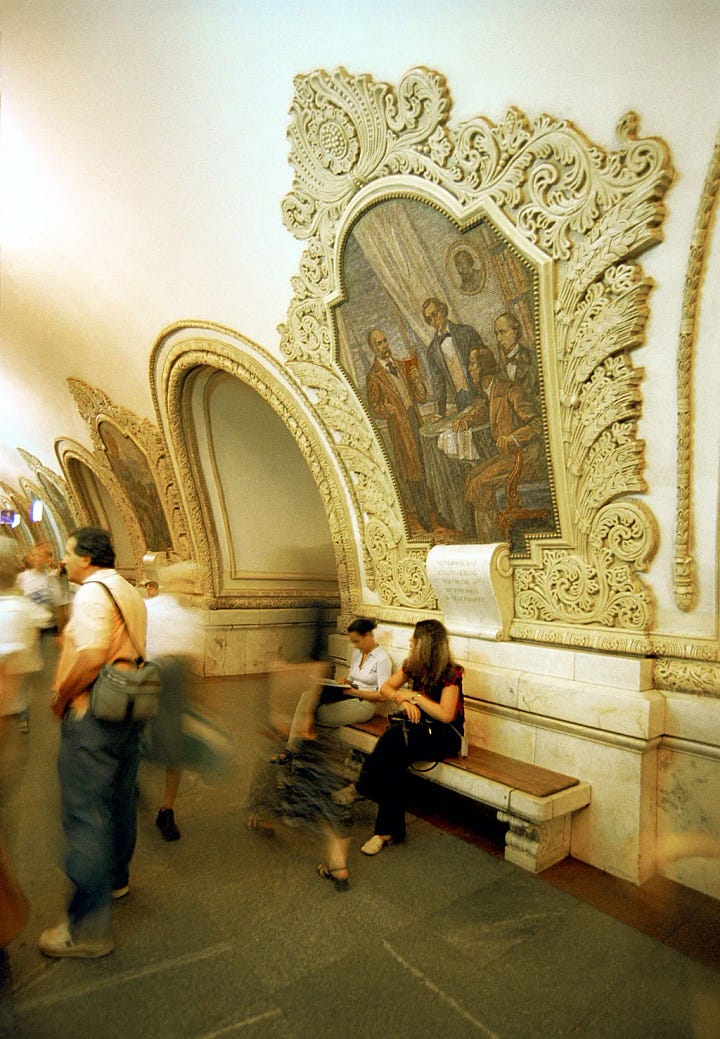 A four-image collage showing ornate and immersive metro stations around the world, including blue painted escalator walls, patterned vaulted ceilings, tiled station interiors, and a train platform with decorative lighting.