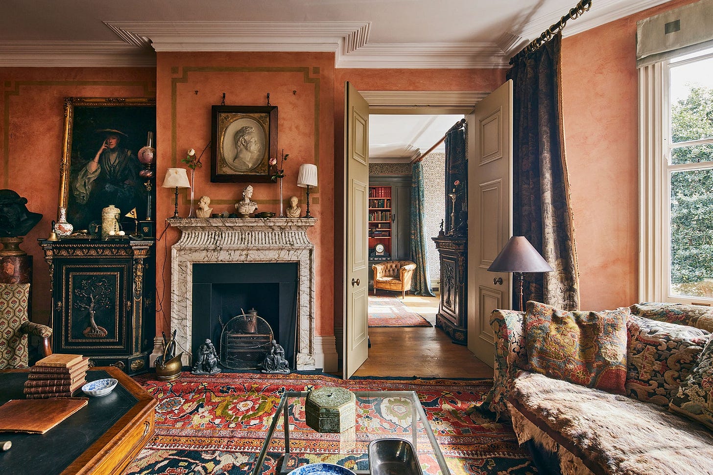 One of the reception rooms with fireplaces set into the dividing wall between the other reception room