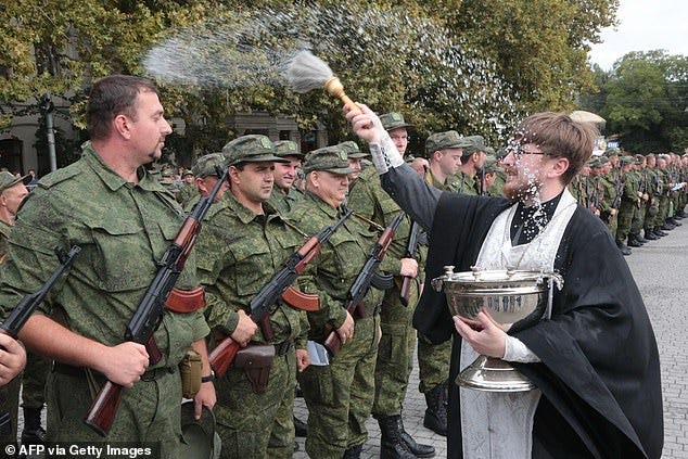 Russian men 'call Ukraine to surrender BEFORE being drafted' | Daily Mail  Online