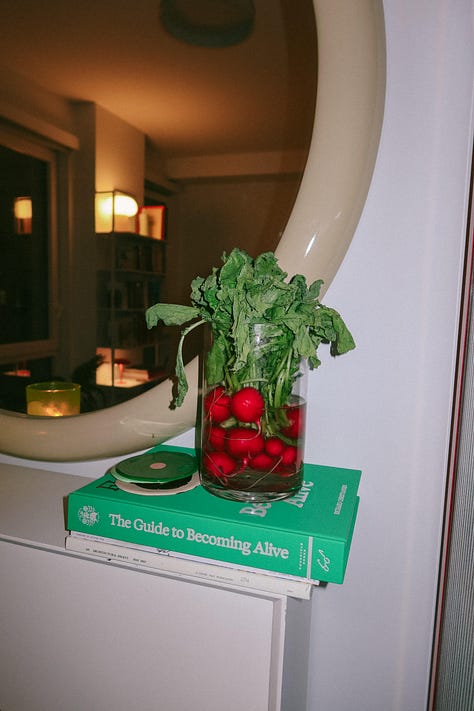 A gallery of three photographs: one of a bouquet of radishes in a jar, one of a woman eating a plate of seasonal food, and the third a closeup of the food on her place