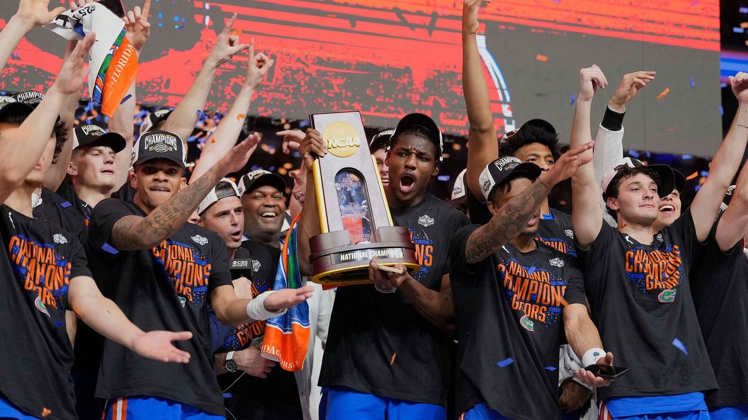 Florida celebrates after beating Houston in the national championship at the Final Four of the NCAA college basketball tournament.