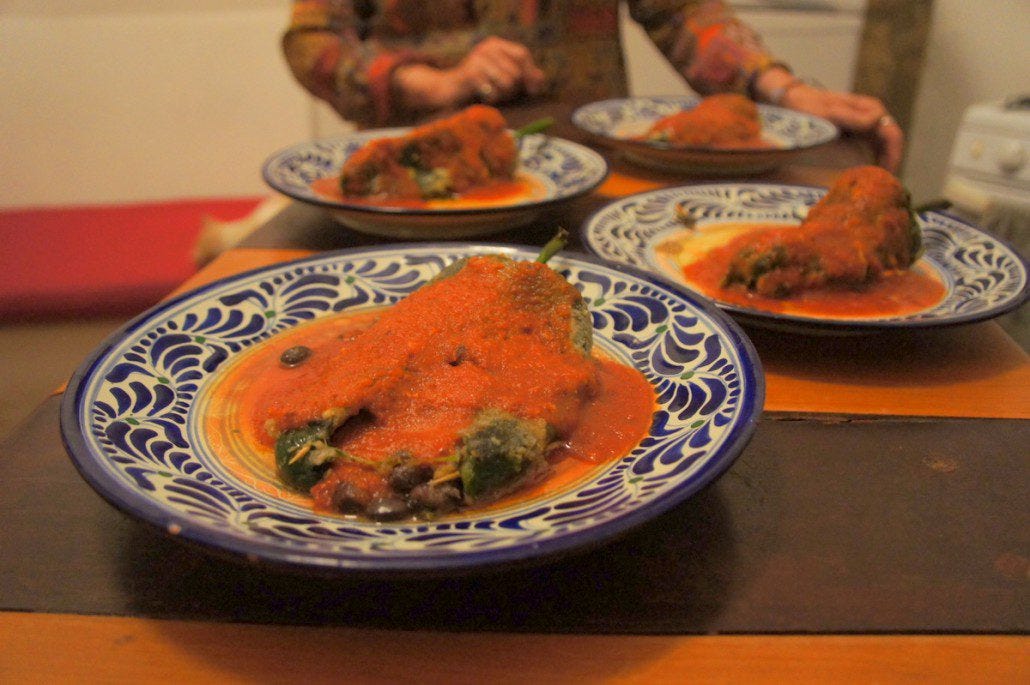 Salsa y chile rellenos cooked over an open fire. Salsa y chile rellenos cooked over an open fire.