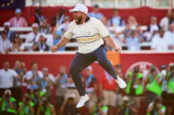 Europe's Shane Lowry celebrates after making the winning putt putt on the 18th hole during their singles match on the Bethpage Black golf course at the Ryder Cup golf tournament, Sunday, Sept. 28, 2025, in Farmingdale, N.Y. (AP Photo/Matt Slocum)