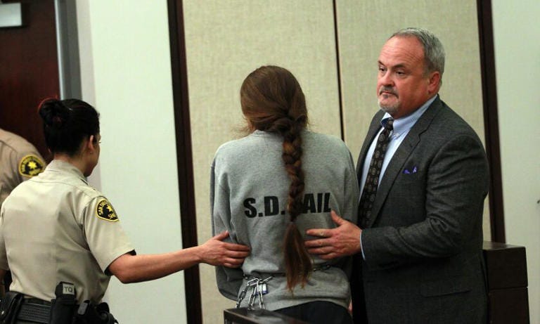 Defense attorney Stephen Cline guides a client charged with murder out of a Superior Court courtroom in Chula Vista in 2015. Cline collapsed Tuesday delivering arguments in a case in a downtown San Diego courtroom and died at a hospital. ((John Gastaldo/The San Diego Union-Tribune)) Defense attorney Stephen Cline guides a client charged with murder out of a Superior Court courtroom in Chula Vista in 2015. Cline collapsed Tuesday delivering arguments in a case in a downtown San Diego courtroom and died at a hospital. ((John Gastaldo/The San Diego Union-Tribune))