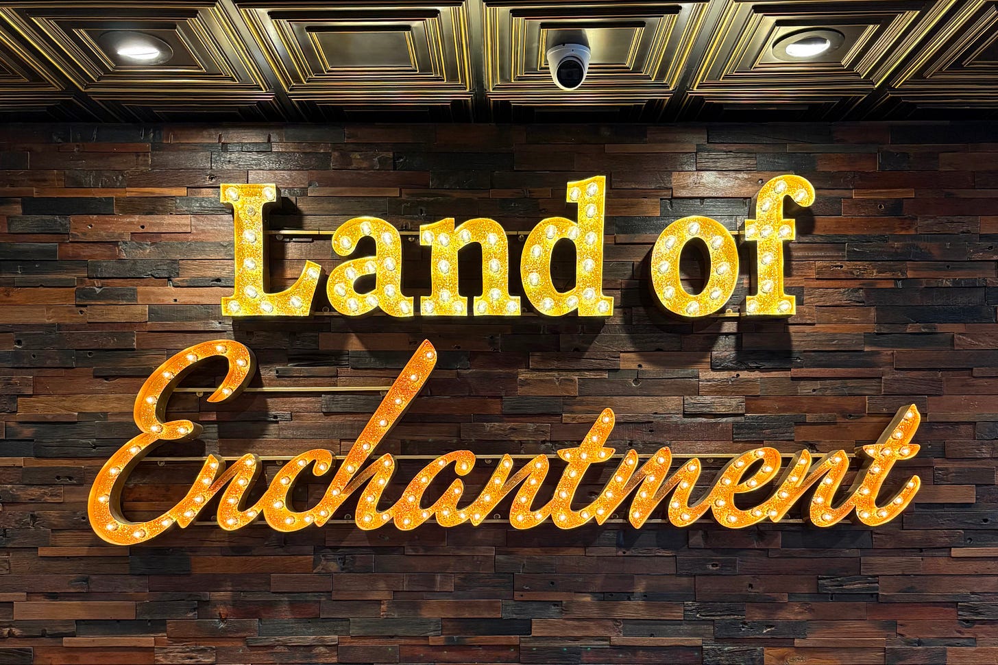 Land of Enchantment sign at our Taos Lodge motel
