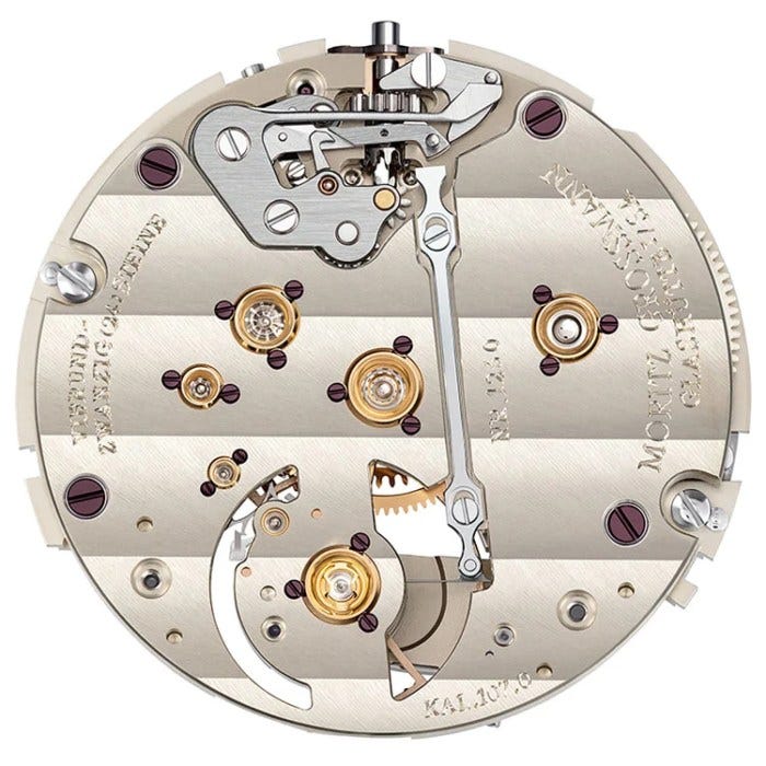 The bar crossing the baseplate is part of the brand’s signature winder and pusher system. The bar crossing the baseplate is part of the brand’s signature winder and pusher system.