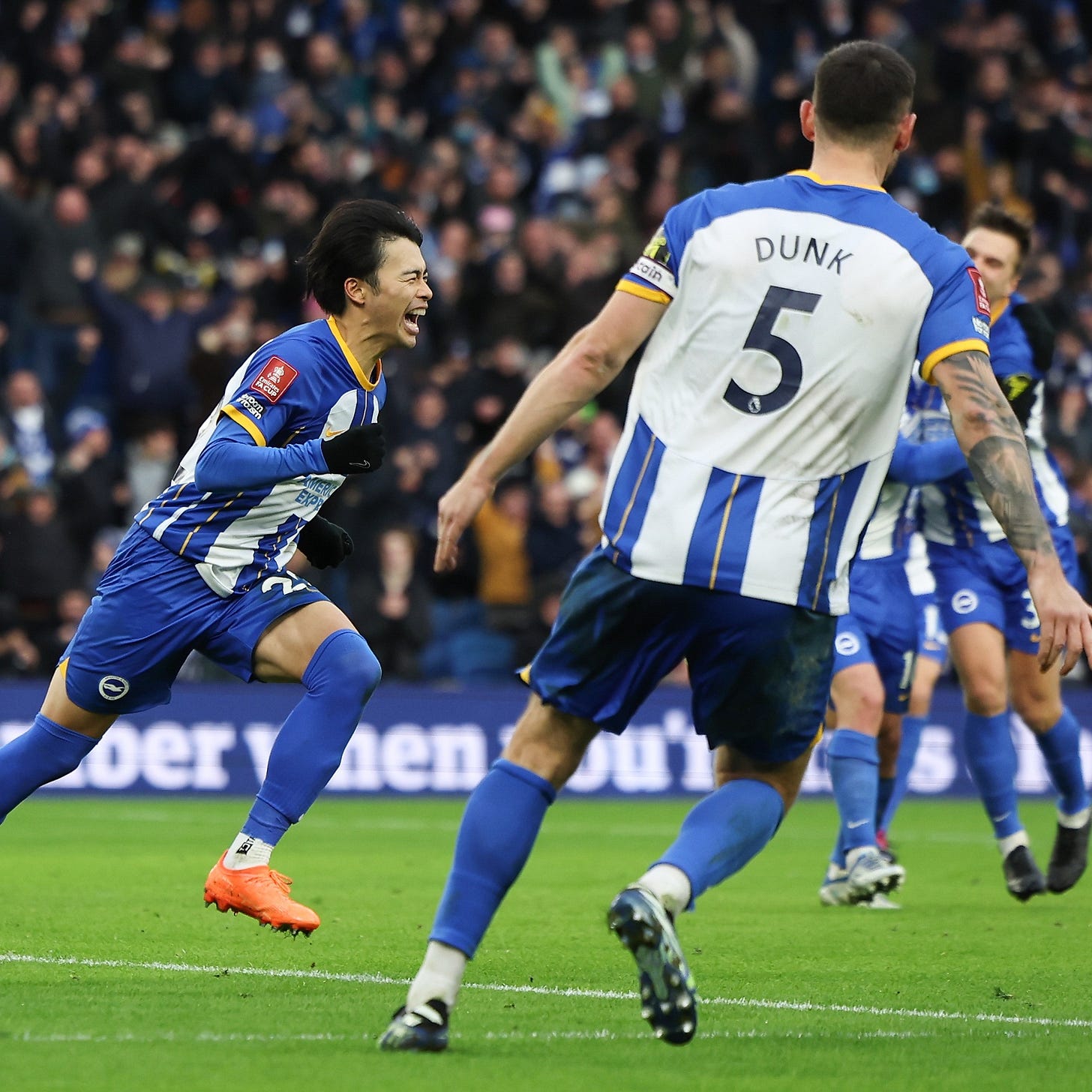 Kaoru celebrates his winner against Liverpool with Dunky in the foreground and Alexis and Joel hugging each other in the background. What. A. Moment.