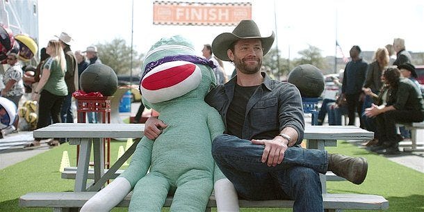 Jared Padalecki sitting with life sized monkey on bench saying classic Friends Joey line how you doin Jared Padalecki sitting with life sized monkey on bench saying classic Friends Joey line how you doin