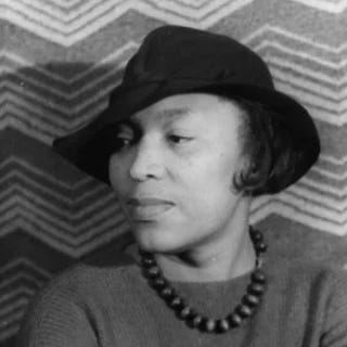 Black-and-white photograph of author Zora Neale Hurston, who wrote the short story "Sweat." Black-and-white photograph of author Zora Neale Hurston, who wrote the short story "Sweat."