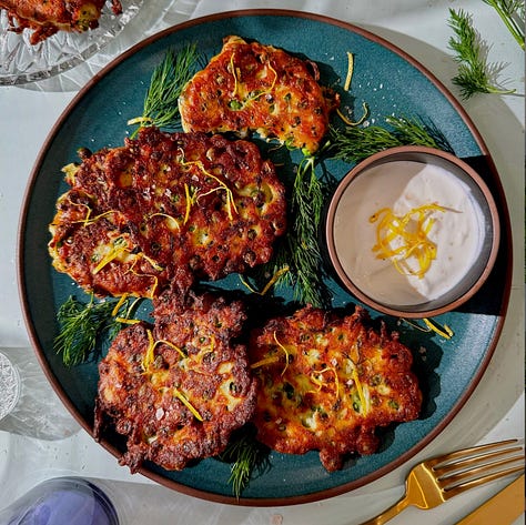 Collage of 7 easy summer appetizer recipes including golden fried zucchini blossoms, crispy eggplant rounds, loaded smashed potatoes, corn rangoons, panko-crusted goat cheese balls, pea fritters, and olive crostini - all ready in 30 minutes or less