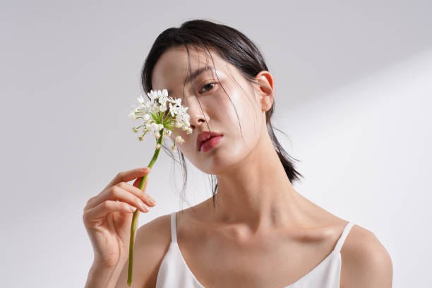 Beauty image of a young Korean woman photographed against a background of light and shadow studio Beauty stock pictures, royalty-free photos & images Beauty image of a young Korean woman photographed against a background of light and shadow studio Beauty stock pictures, royalty-free photos & images