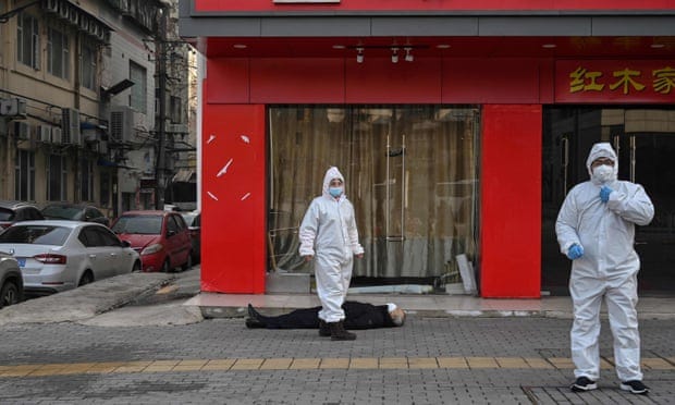 A man lies dead in the street: the image that captures the Wuhan coronavirus crisis | Coronavirus | The Guardian A man lies dead in the street: the image that captures the Wuhan coronavirus crisis | Coronavirus | The Guardian