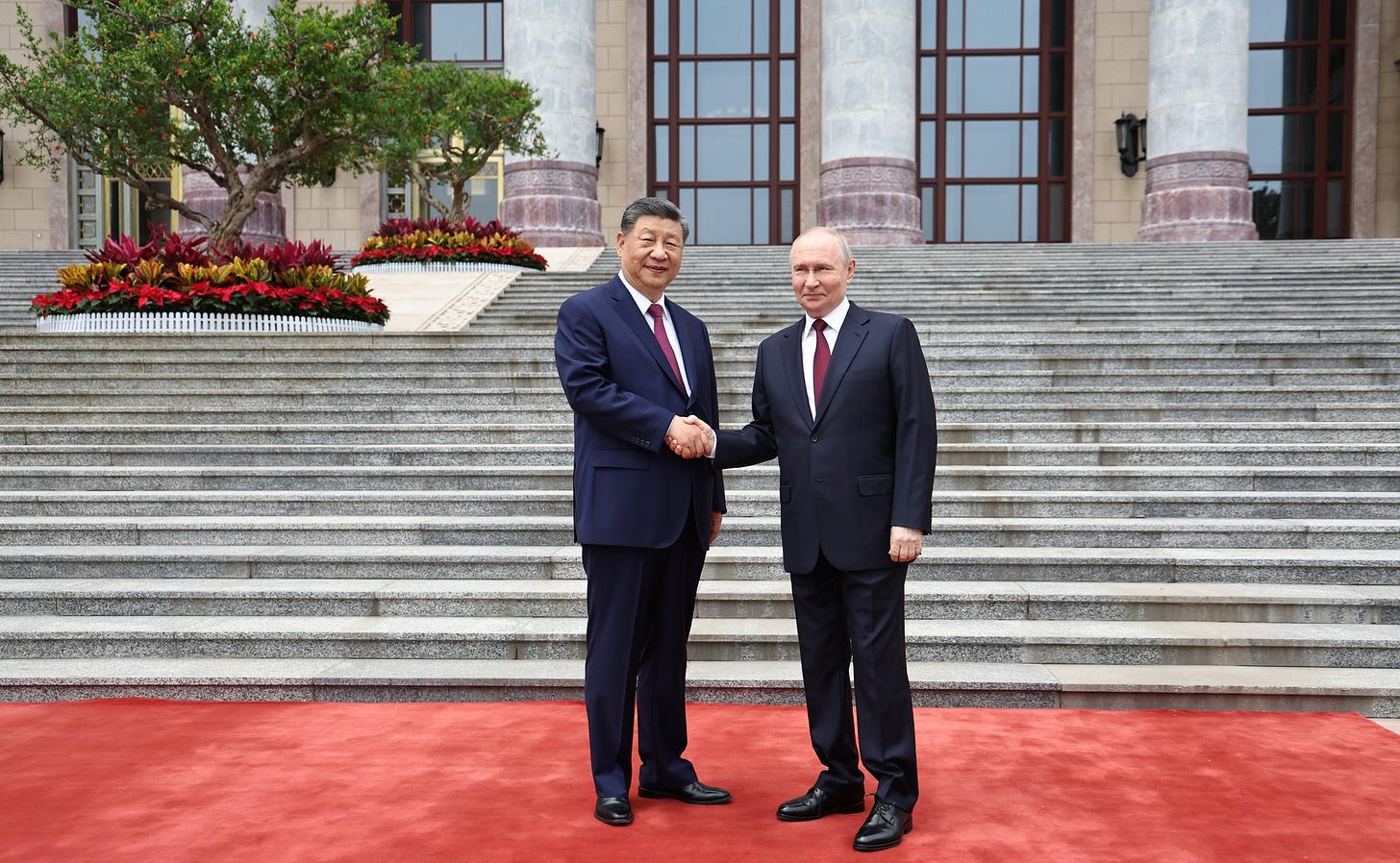 With President of the People’s Republic of China Xi Jinping during the official welcome ceremony. With President of the People’s Republic of China Xi Jinping during the official welcome ceremony.