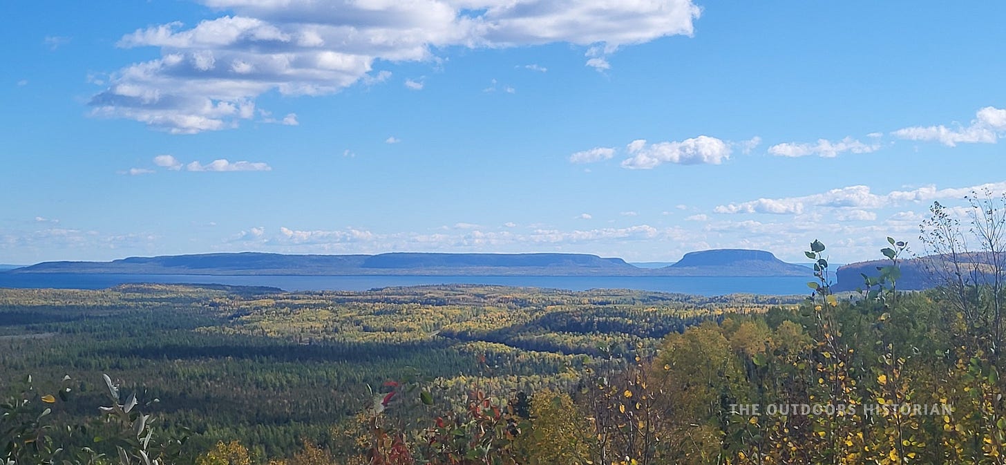 A panoramic view looking down over the city infrastructure and harbor of Thunder Bay from a high vantage point in the fall.