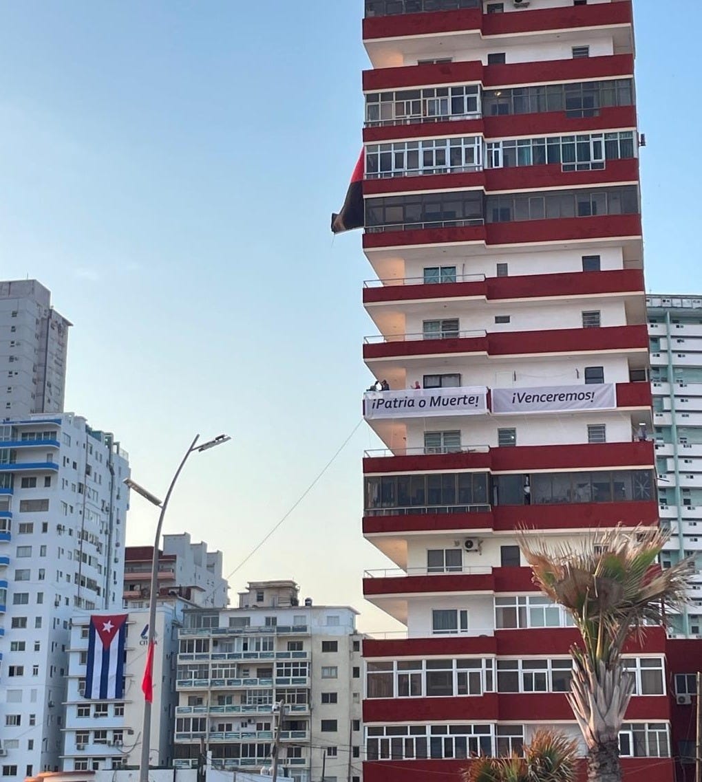 A tall building with a flag on it
AI-generated content may be incorrect. A tall building with a flag on it
AI-generated content may be incorrect.
