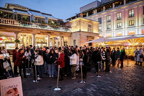 Photos of a maroon Clinique van in Covent Garden and lines of people queuing.