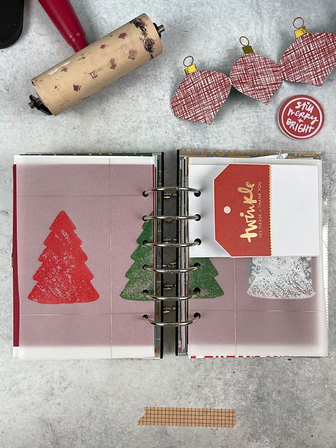 Scrapbook pages with various colors, cut outs, photos, and textured papers.