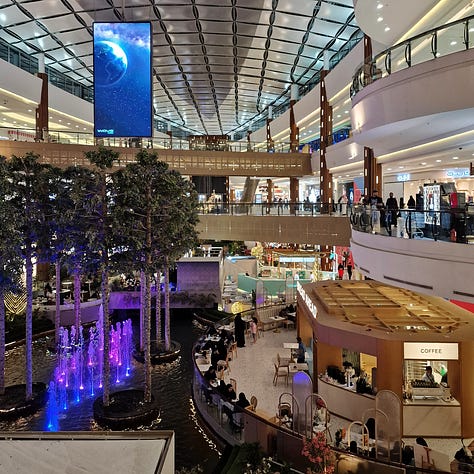 Riyadh Gallery Mall (left), one of the most visited malls in Riyadh. American brands like the restaurant chain Olive Garden (center) dominate foreign presence, with little European influence. Sometimes the sidewalk just ends (right) without warning.
