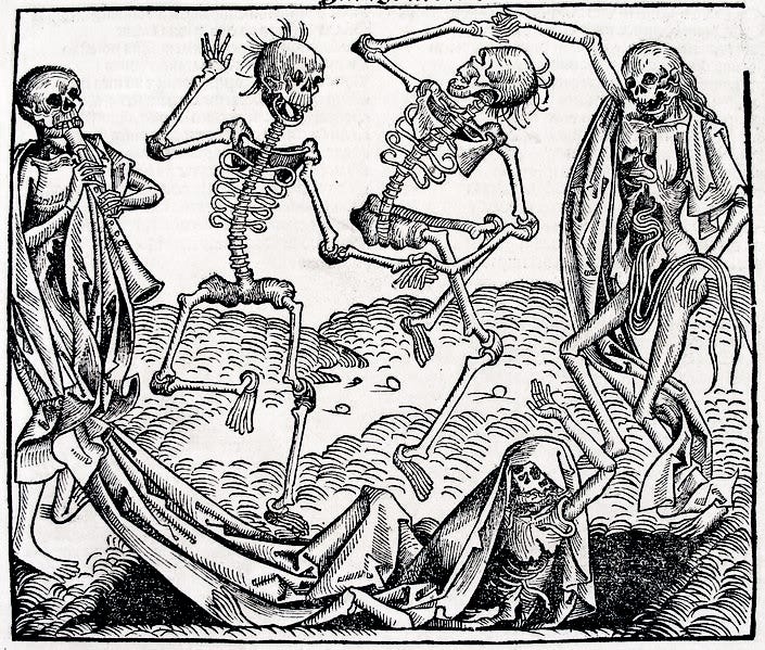 skeletons dancing around a grave